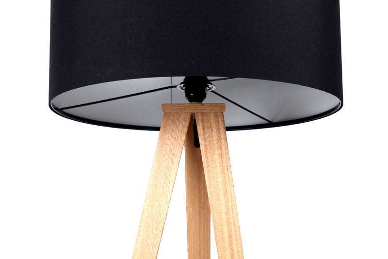 Moderne Dreifuß Stehleuchte in Holzoptik mit einem Lampenschirm in zwei Farben: schwarz und weiß